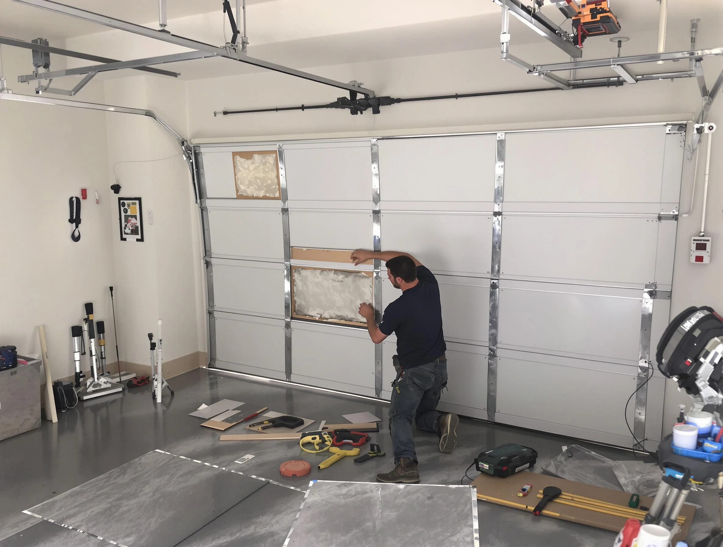 Garage Door Panel Repair in Bedford